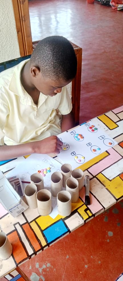 Children engaged in painting activities