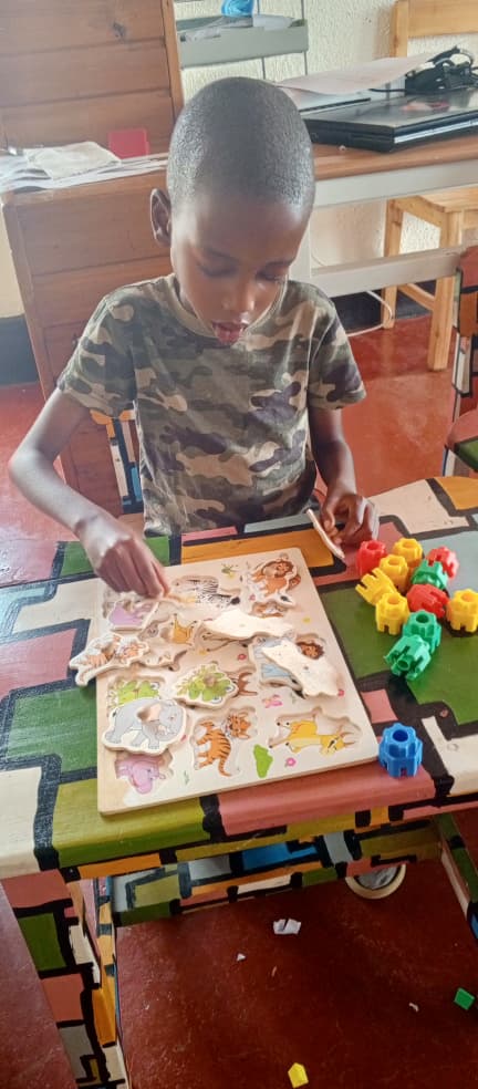 Children engaged in painting activities