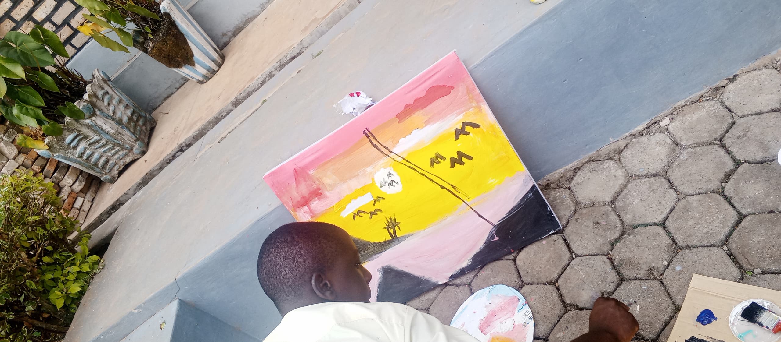 Children engaged in painting activities