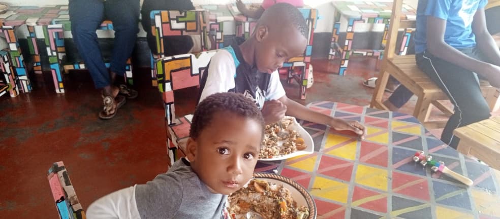 Children learning table setting