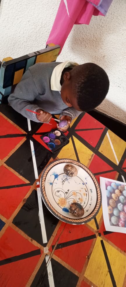 Group learning activity with children and teacher